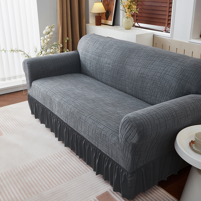 91家纺网 家纺一手货源 找家纺 飞翔家纺沙发套 2026新款素格纹裙摆沙发套 深灰色