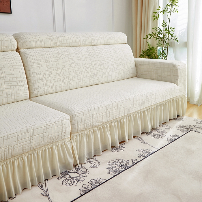 91家纺网 家纺一手货源 找家纺 飞翔家纺沙发套 2026新款素格纹裙摆沙发套贵妃 米白色