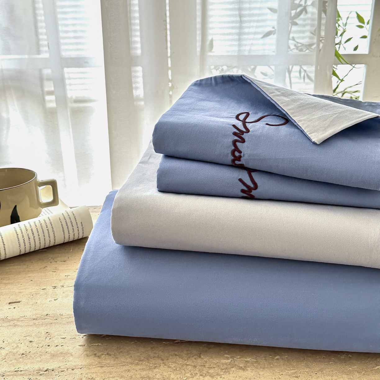 91家纺网 家纺一手货源 找家纺 ab家纺 2026新款刺绣双拼40支全棉水洗四件套 晴空蓝烟灰