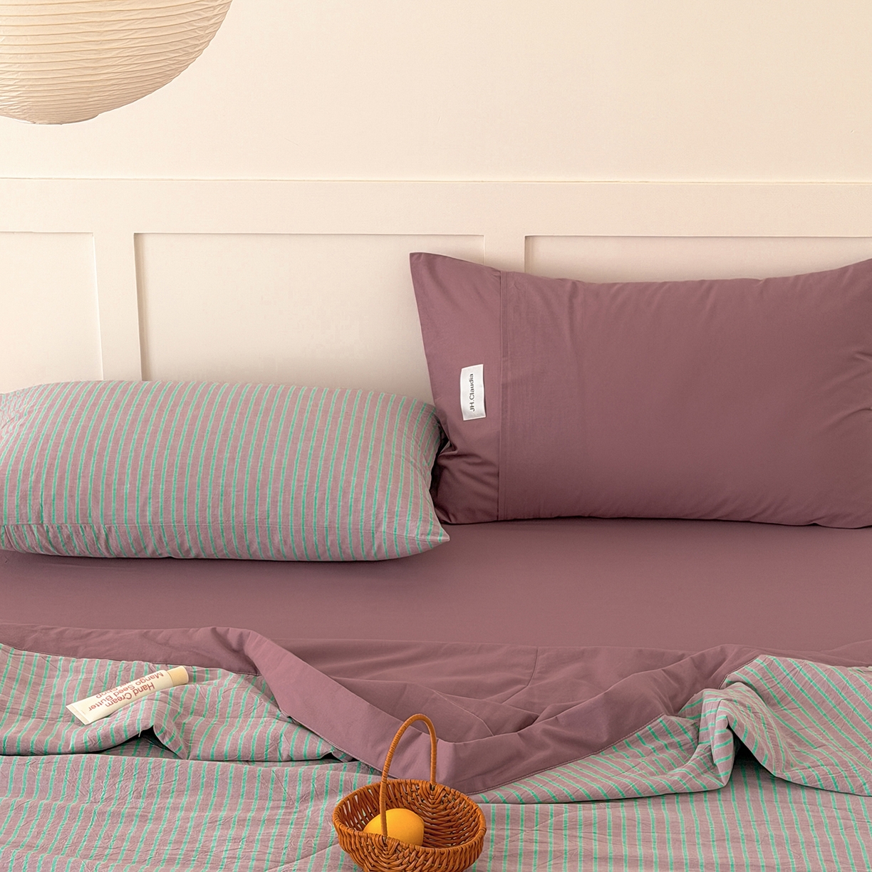 91家纺网 家纺一手货源 找家纺 玖弘家居 2026新款凉感亲肤羽丝棉夏被 粉紫条