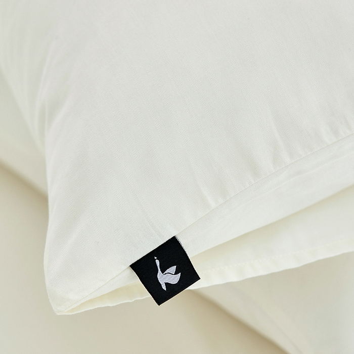 91家纺网 家纺一手货源 找家纺 2026新款A类40S全棉糯感大雁纹提花单品枕套 奶白