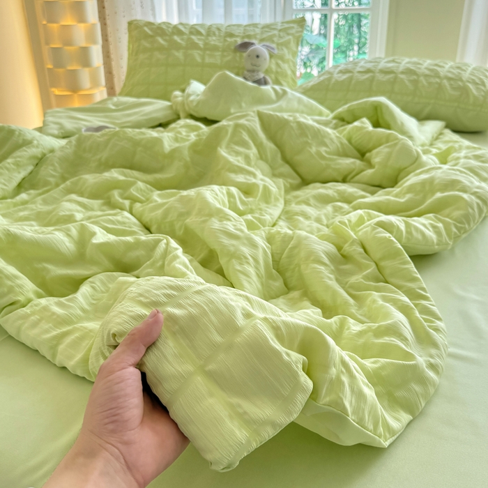 91家纺网 家纺一手货源 找家纺 卡斯诺家纺馆 2026新款亲肤泡泡纱夏被四件套 苹果绿