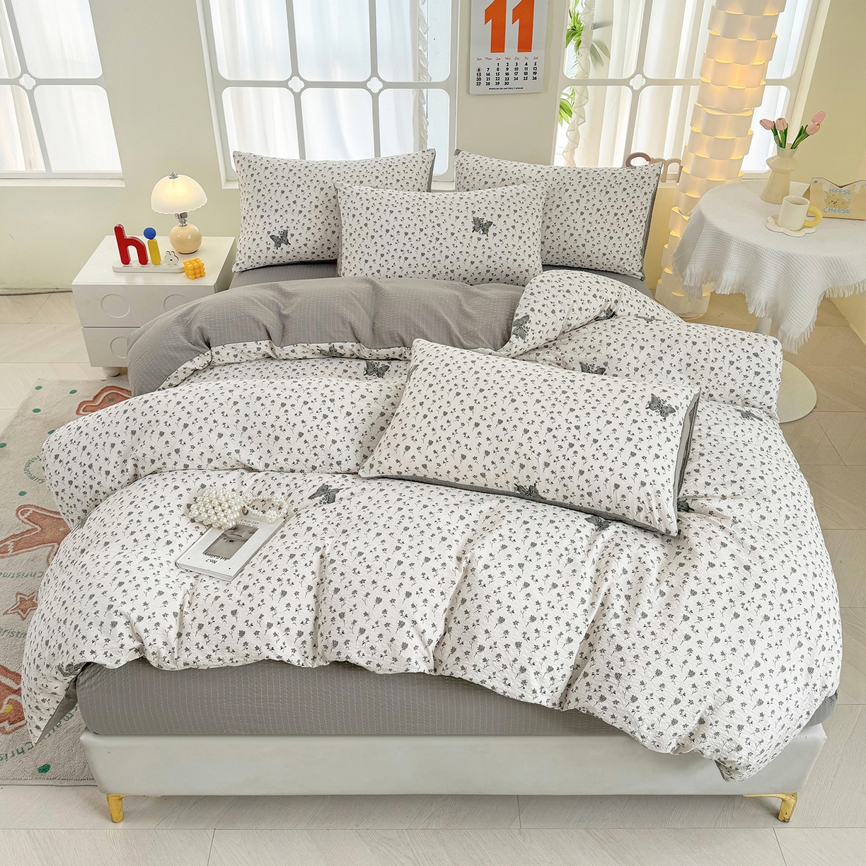 91家纺网 家纺一手货源 找家纺 悠米悠家 2026春夏新款高克重A类泡芙纱泡泡皱皱纱四件套 墨染春枝-蝶舞-床单款