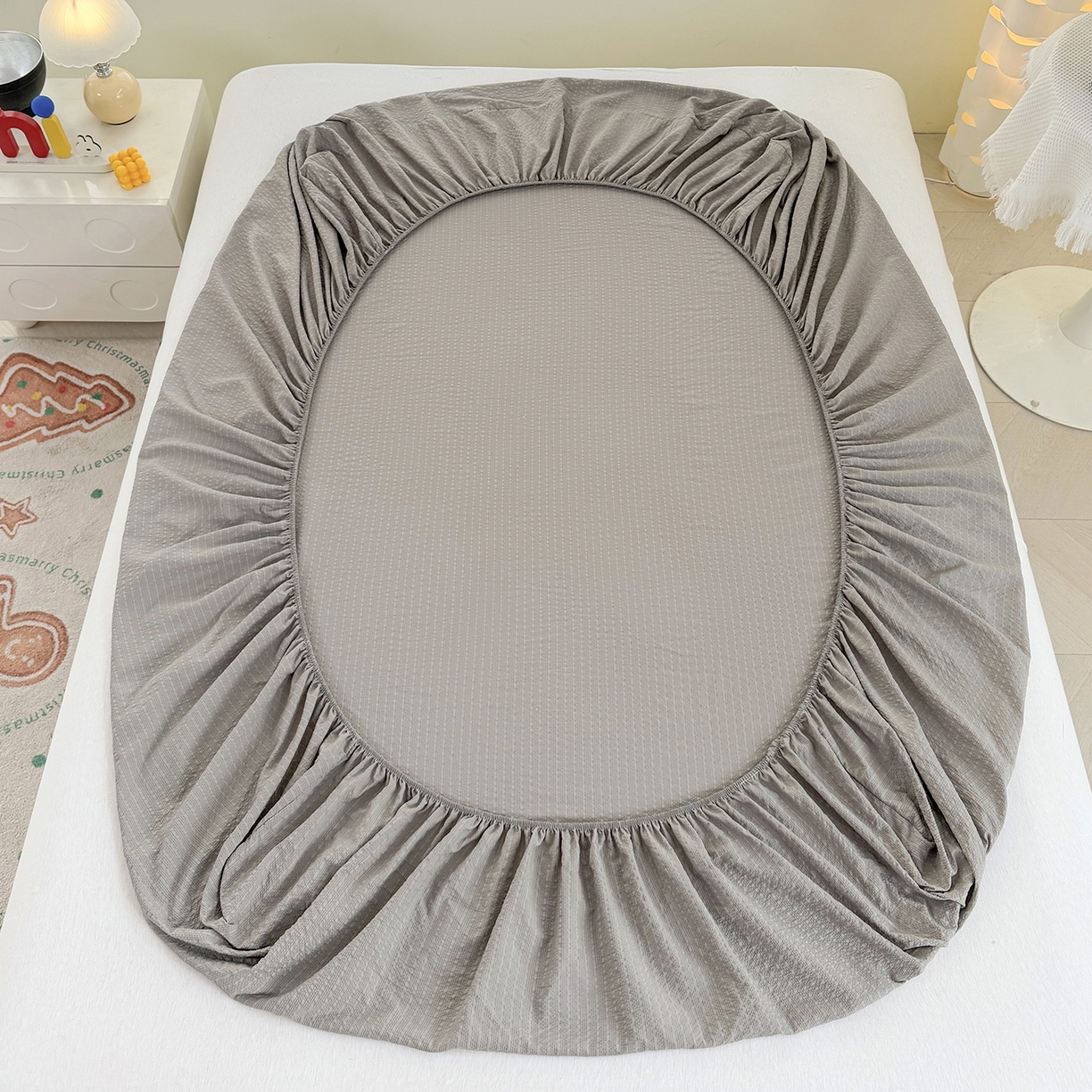 91家纺网 家纺一手货源 找家纺 悠米悠家 2026春夏新款高克重A类泡芙纱泡泡皱皱纱四件套 墨染春枝-蝶舞-床单款