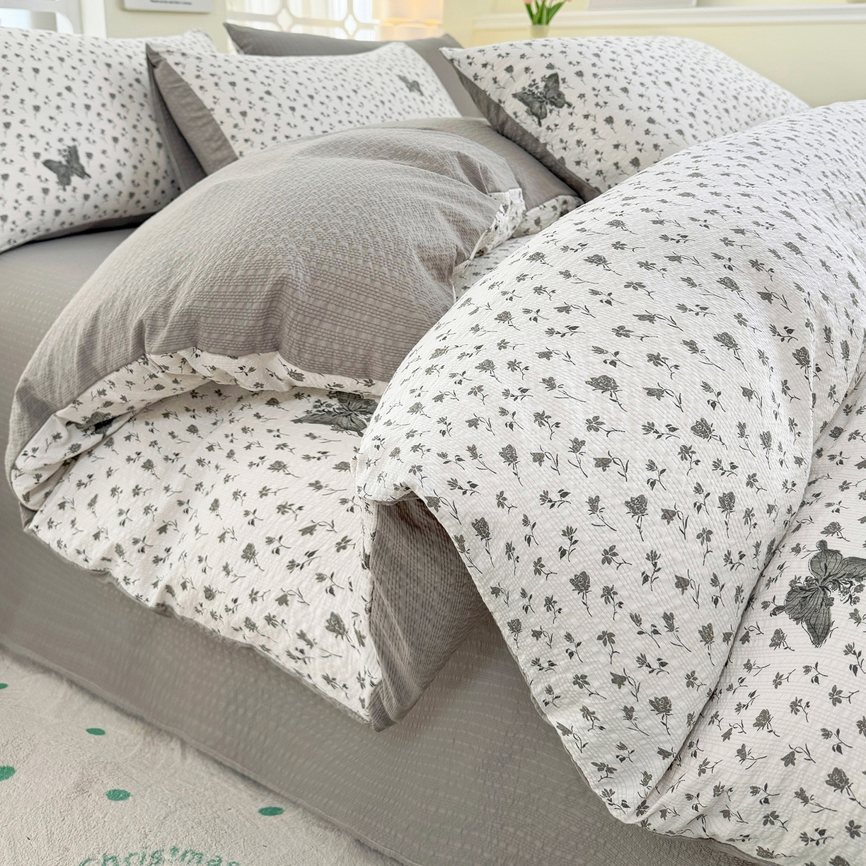 91家纺网 家纺一手货源 找家纺 悠米悠家 2026春夏新款高克重A类泡芙纱泡泡皱皱纱四件套 墨染春枝-蝶舞-床单款