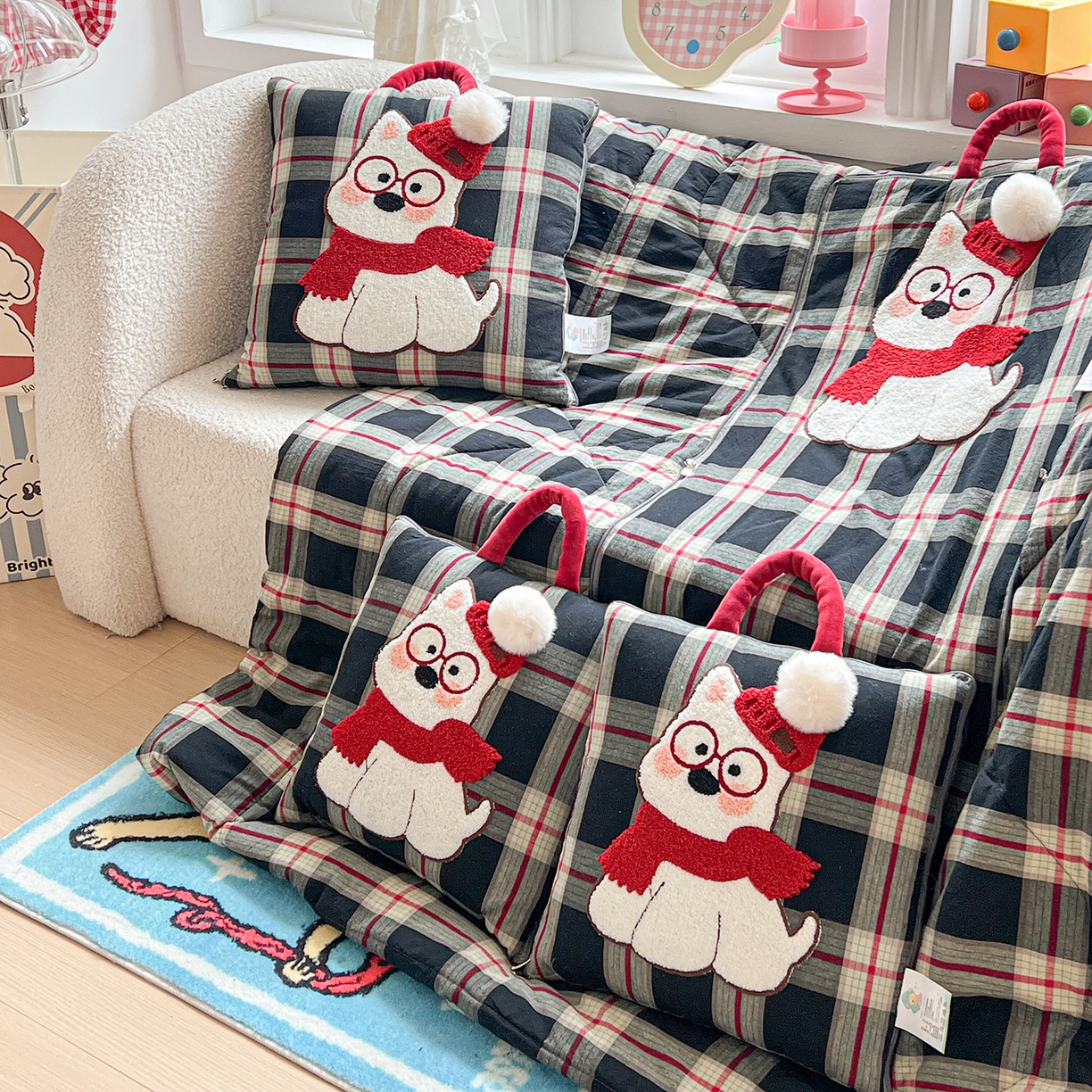 91家纺网 家纺一手货源 找家纺 古本家居 2026春夏新款全棉美拉德西高地系列抱枕被 全棉美拉德围巾西高地黑格