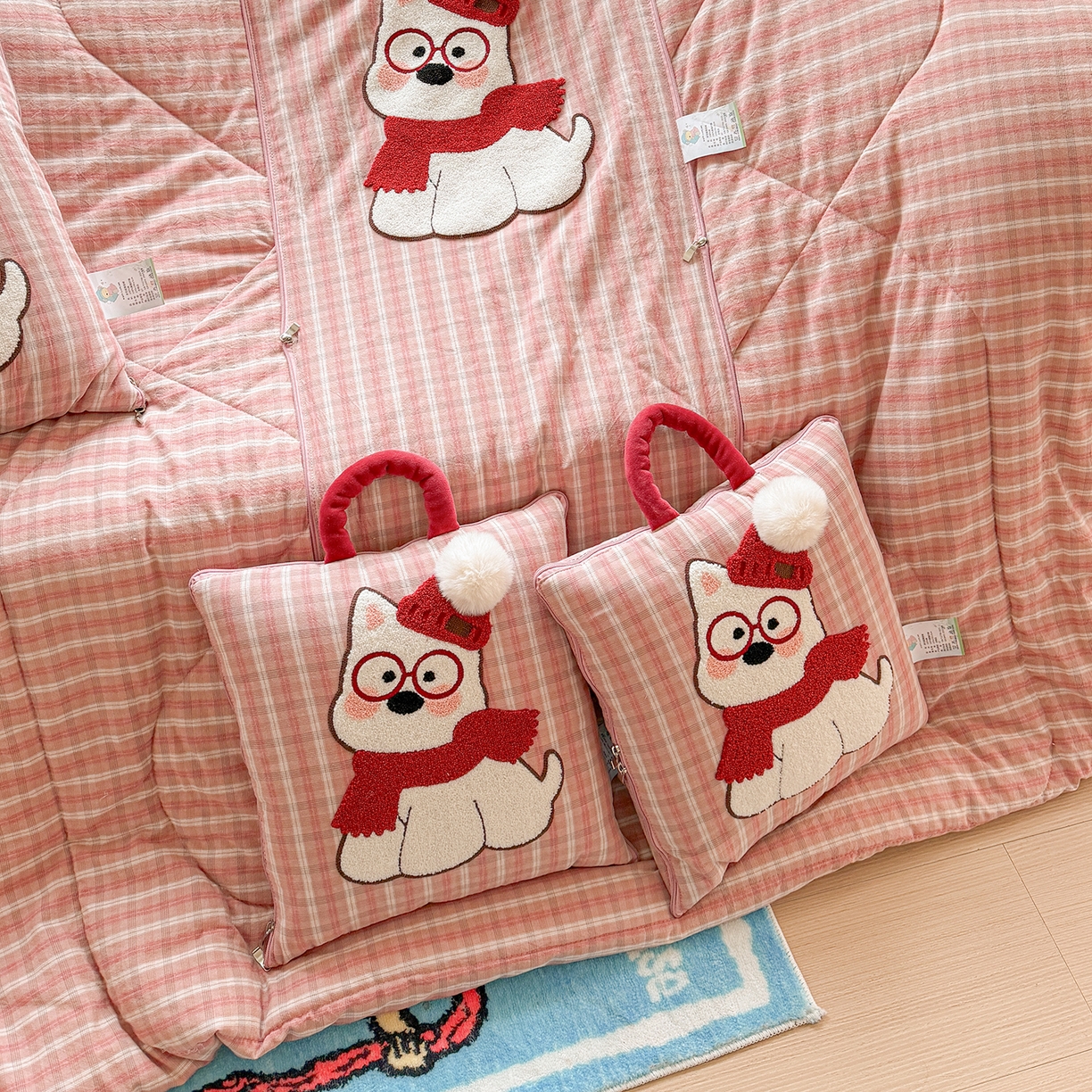 91家纺网 家纺一手货源 找家纺 古本家居 2026春夏新款全棉美拉德西高地系列抱枕被 全棉美拉德围巾西高地粉格