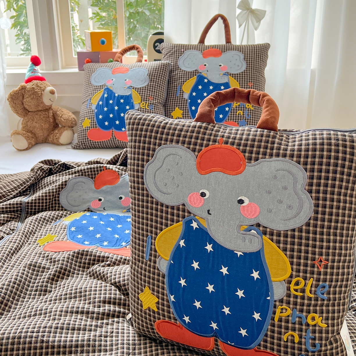 91家纺网 家纺一手货源 找家纺 （总）古本家居 2026春夏新款全棉小丑象系列抱枕被