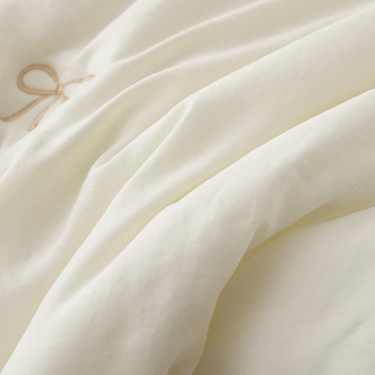 91家纺网 家纺一手货源 找家纺 推推家纺 2026新款水洗棉床盖夏被四件套 蝴蝶结-米白