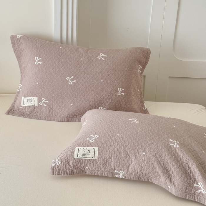 91家纺网 家纺一手货源 找家纺 乐家毛巾被（工厂自产自销） 2026新款精梳安心棉全棉纯棉色织提花枕巾单枕巾枕巾单件 蝴蝶结枕巾