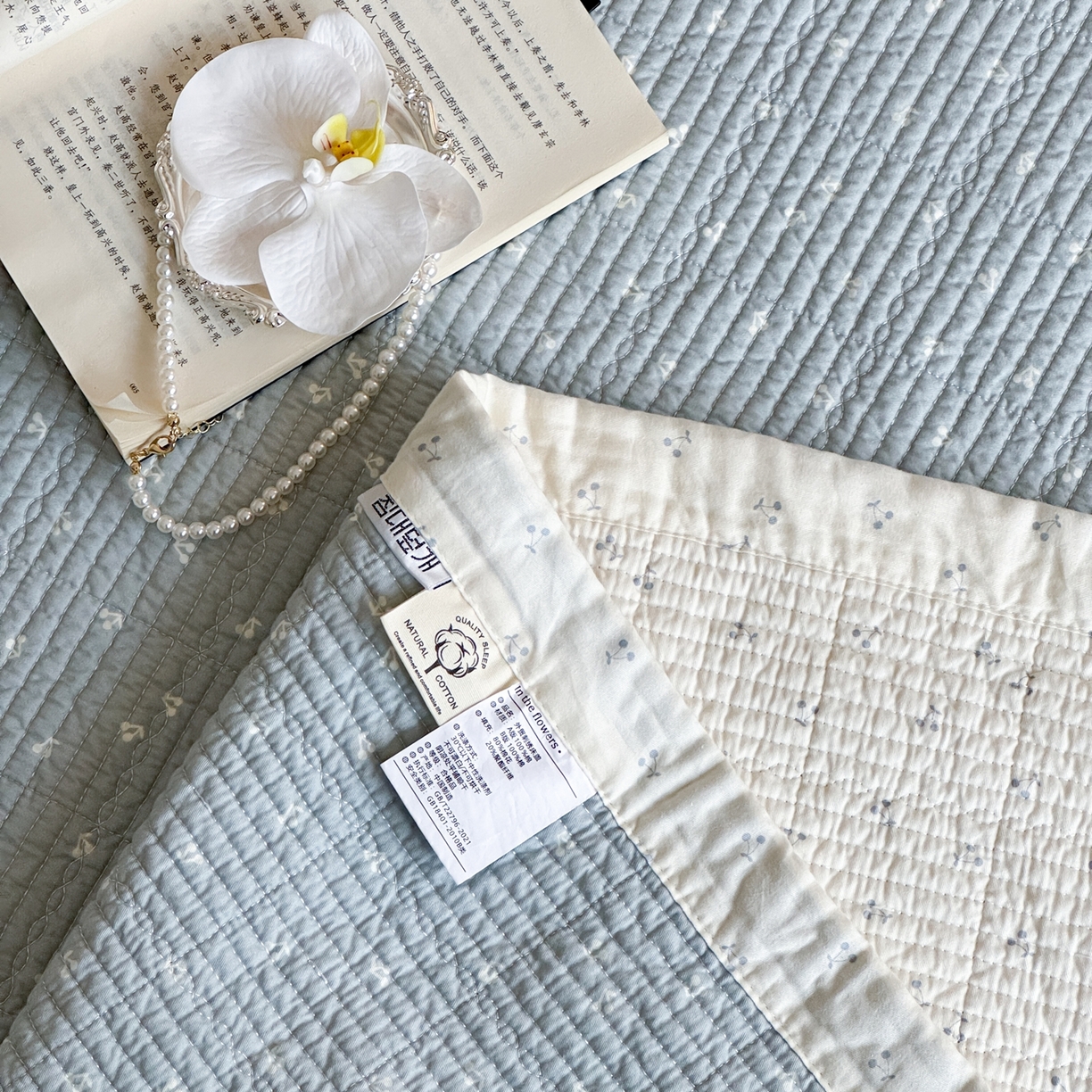 91家纺网 家纺一手货源 找家纺 床盖工厂店 2026春夏新款双面100%全棉填充80棉花床盖三件套 樱语兰