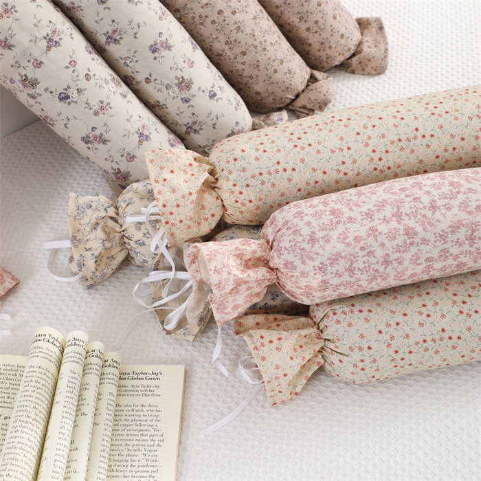 91家纺网 家纺一手货源 找家纺 （总）仁宇枕业 2026新款新品全棉小碎花糖果枕头圆形颈椎荞麦枕头枕芯