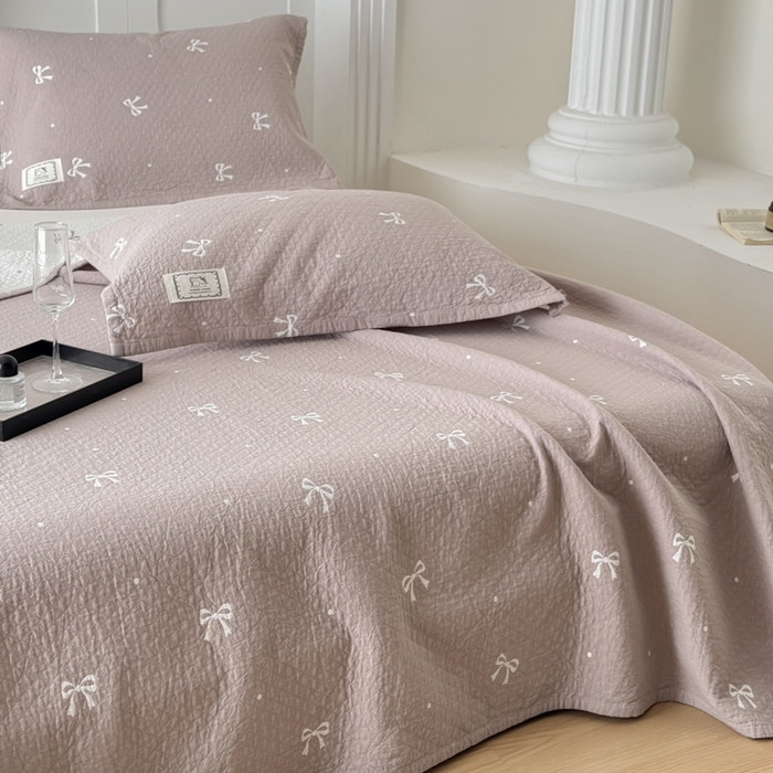 91家纺网 家纺一手货源 找家纺 乐家毛巾被（工厂自产自销） 2026新款精梳安心棉色织提花床盖毛巾被两用 蝴蝶结床盖