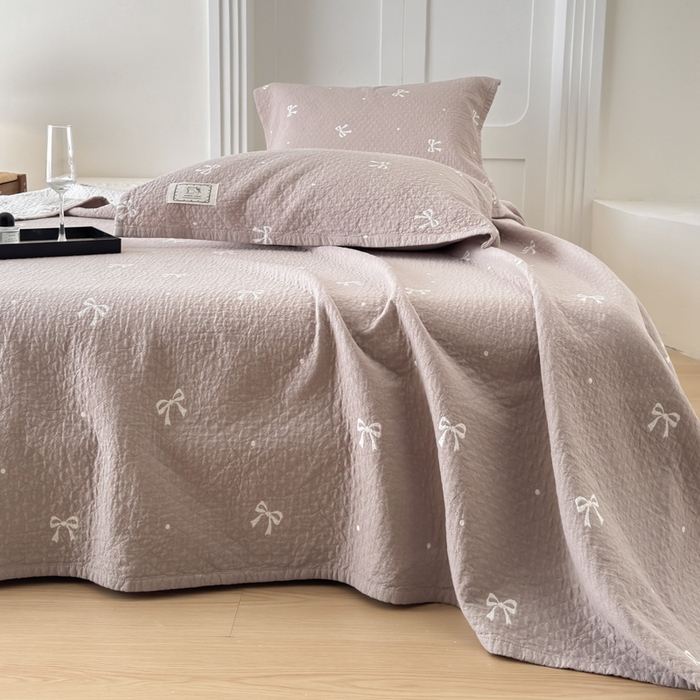 91家纺网 家纺一手货源 找家纺 乐家毛巾被（工厂自产自销） 2026新款精梳安心棉色织提花床盖毛巾被两用 蝴蝶结床盖