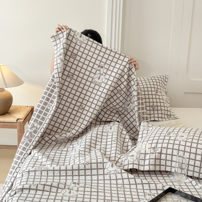 91家纺网 家纺一手货源 找家纺 乐家毛巾被（工厂自产自销） 2026新款精梳安心棉色织提花床盖毛巾被两用 墨镜鸭床盖