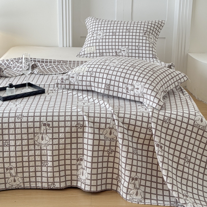 91家纺网 家纺一手货源 找家纺 乐家毛巾被（工厂自产自销） 2026新款精梳安心棉色织提花床盖毛巾被两用 墨镜鸭床盖