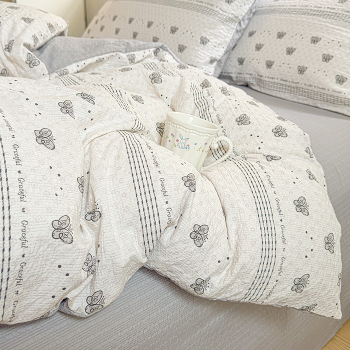 91家纺网 家纺一手货源 找家纺 桔禾家纺 2026春夏新款小清新A类超柔泡芙棉泡泡纱双层纱四件套 蝶语