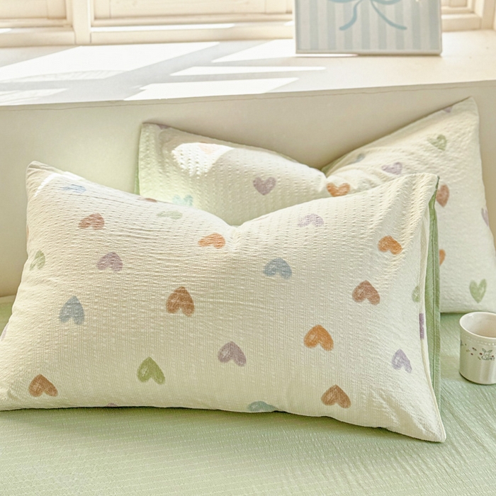 91家纺网 家纺一手货源 找家纺 桔禾家纺 2026春夏新款小清新A类超柔泡芙棉泡泡纱双层纱四件套 马卡龙爱心