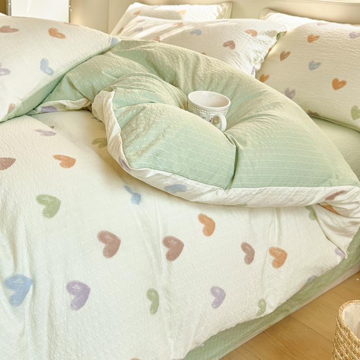 91家纺网 家纺一手货源 找家纺 桔禾家纺 2026春夏新款小清新A类超柔泡芙棉泡泡纱双层纱四件套 马卡龙爱心