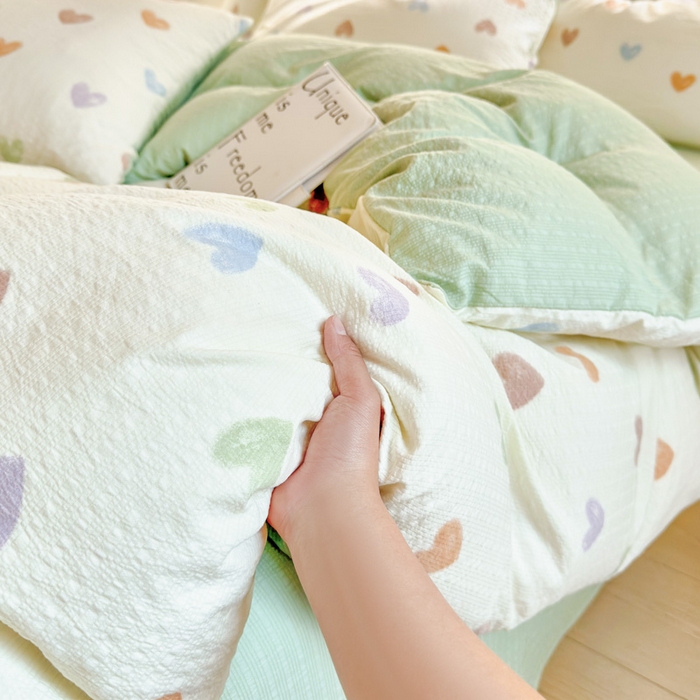 91家纺网 家纺一手货源 找家纺 桔禾家纺 2026春夏新款小清新A类超柔泡芙棉泡泡纱双层纱四件套 马卡龙爱心