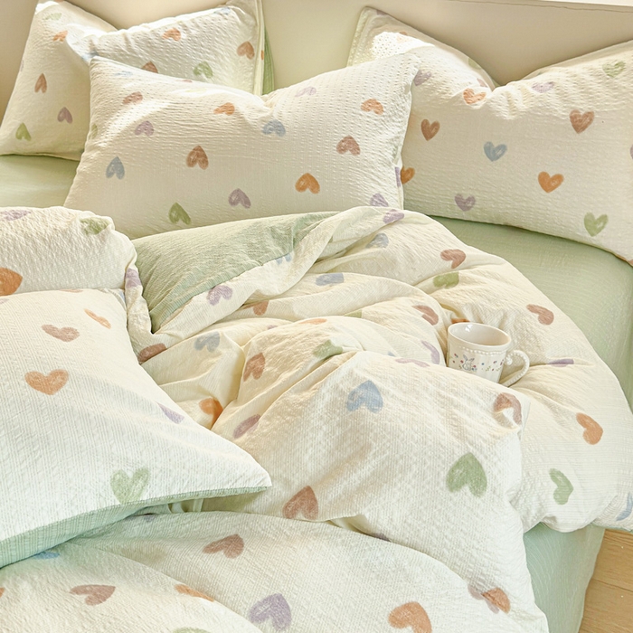 91家纺网 家纺一手货源 找家纺 桔禾家纺 2026春夏新款小清新A类超柔泡芙棉泡泡纱双层纱四件套 马卡龙爱心