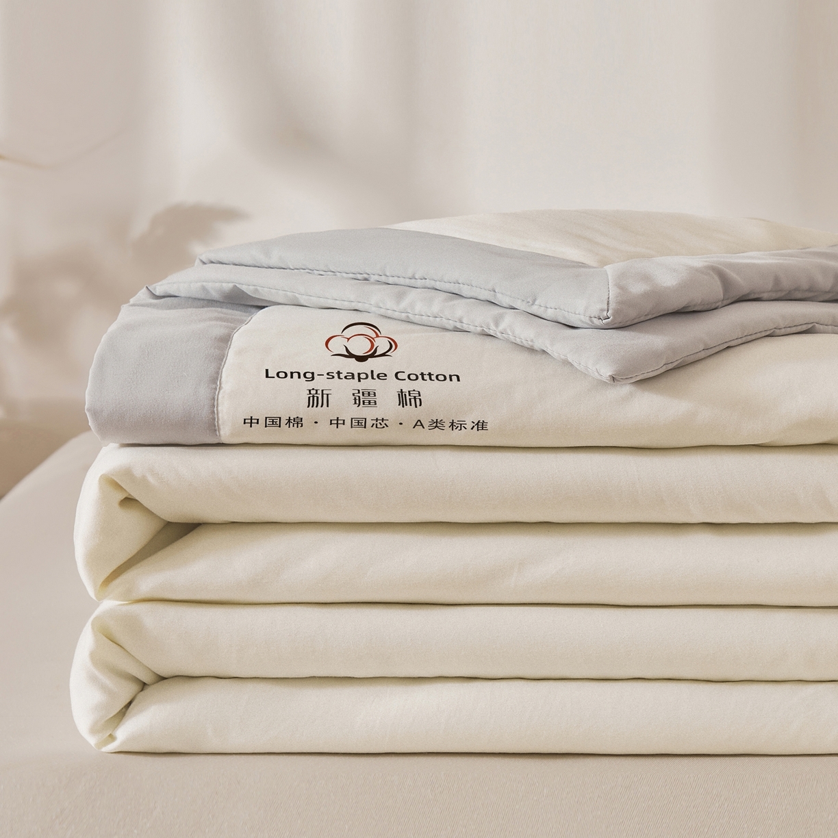 91家纺网 家纺一手货源 找家纺 初相识被业 2026春夏新款A类水洗棉纯色双拼新疆棉花被夏被夏凉被空调被 新疆棉云朵白拼灰