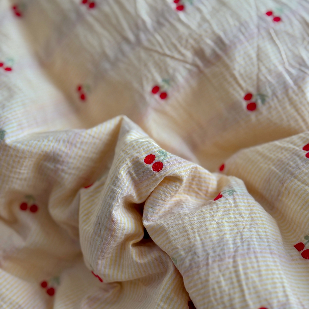 91家纺网 家纺一手货源 找家纺 田野 2026新款全棉水洗提花贝壳边四件套 桔条樱语