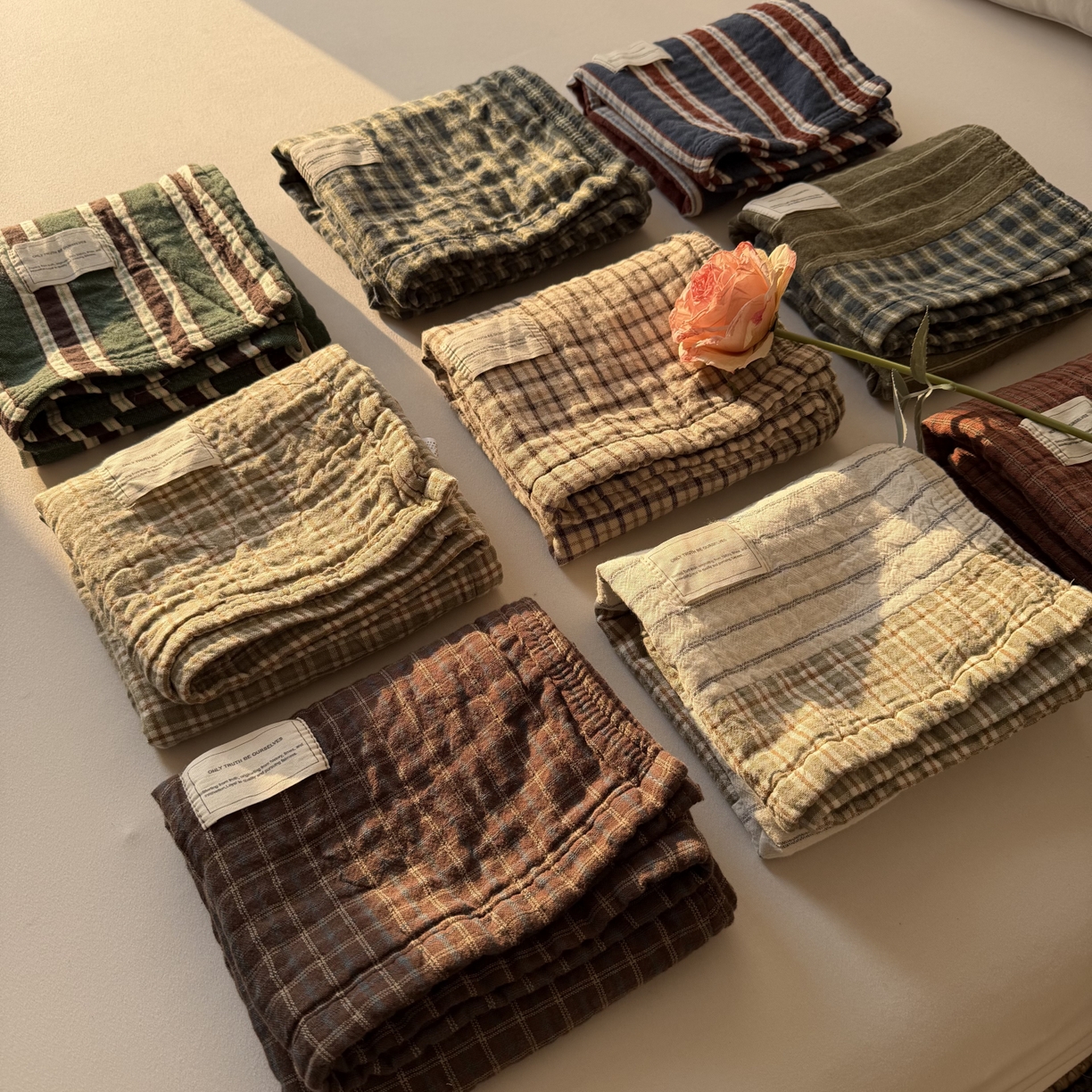 91家纺网 家纺一手货源 找家纺 （总）百寐 2026百分百全棉A类色织枕巾52*75条纹格子美拉德色系纯棉吸汗枕巾风格二