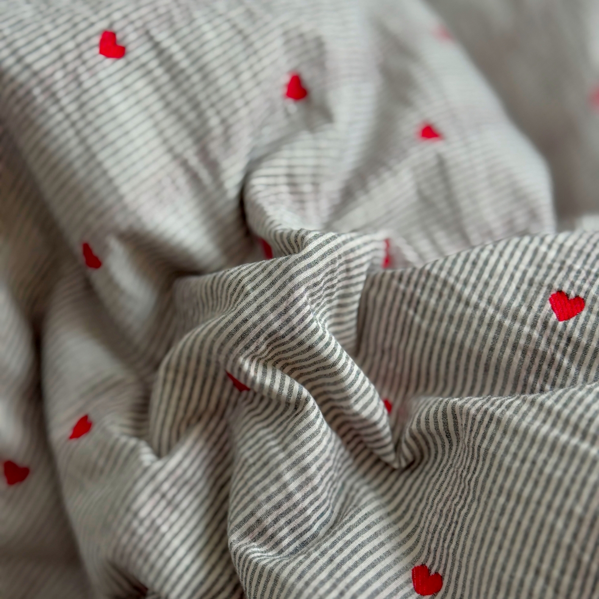 91家纺网 家纺一手货源 找家纺 田野 2026新款全棉水洗提花贝壳边四件套 桃心