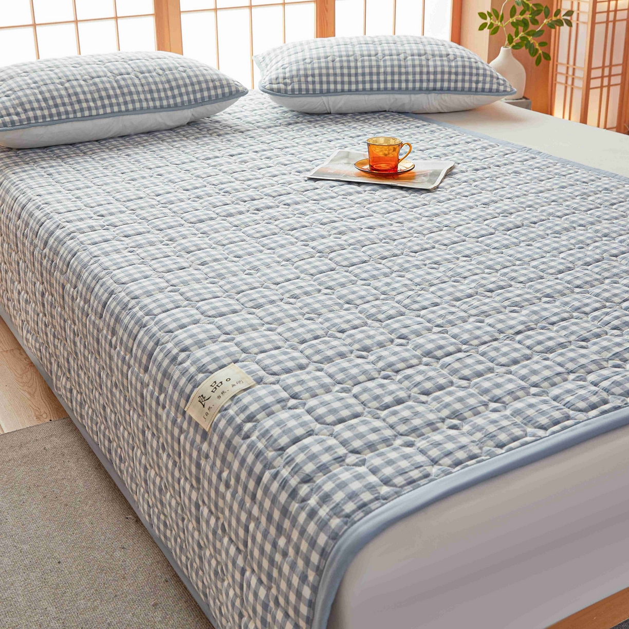 91家纺网 家纺一手货源 找家纺 曼陀罗 2026新款无印风新疆棉花床垫床护垫 蓝小格