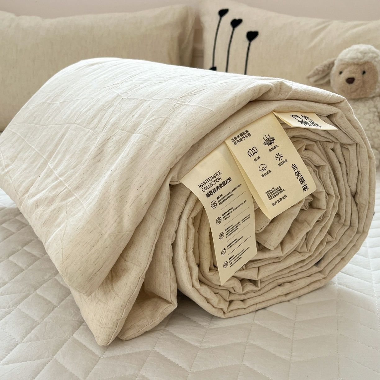 91家纺网 家纺一手货源 找家纺 一加一 2026春夏新款全棉纯棉色织水洗棉麻毛巾绣大豆夏被-心心相依 棉麻音符-奶白