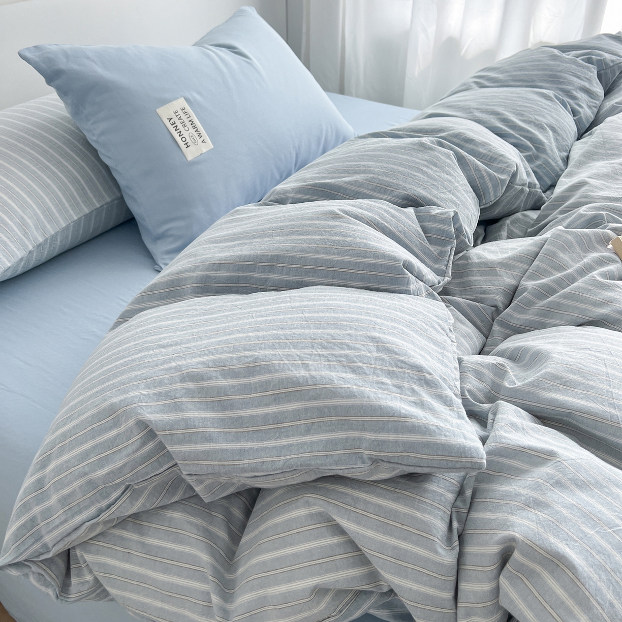 91家纺网 家纺一手货源 找家纺 早晨家纺 2026新款INS博主风A类全棉纯棉色织水洗棉格子四件套 知夏-蓝条纹