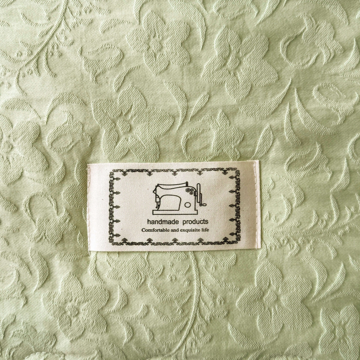 91家纺网 家纺一手货源 找家纺 乐家毛巾被（工厂自产自销） 2026春夏新款全棉60S长绒棉立体厚织提花整张棉花夏被四件套单夏被枕套夏凉被空 篱上花