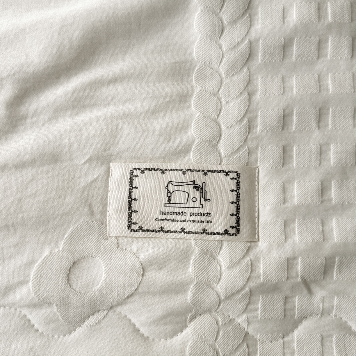 91家纺网 家纺一手货源 找家纺 乐家毛巾被（工厂自产自销） 2026春夏新款全棉60S长绒棉立体厚织提花整张棉花夏被四件套单夏被枕套夏凉被空 落痕