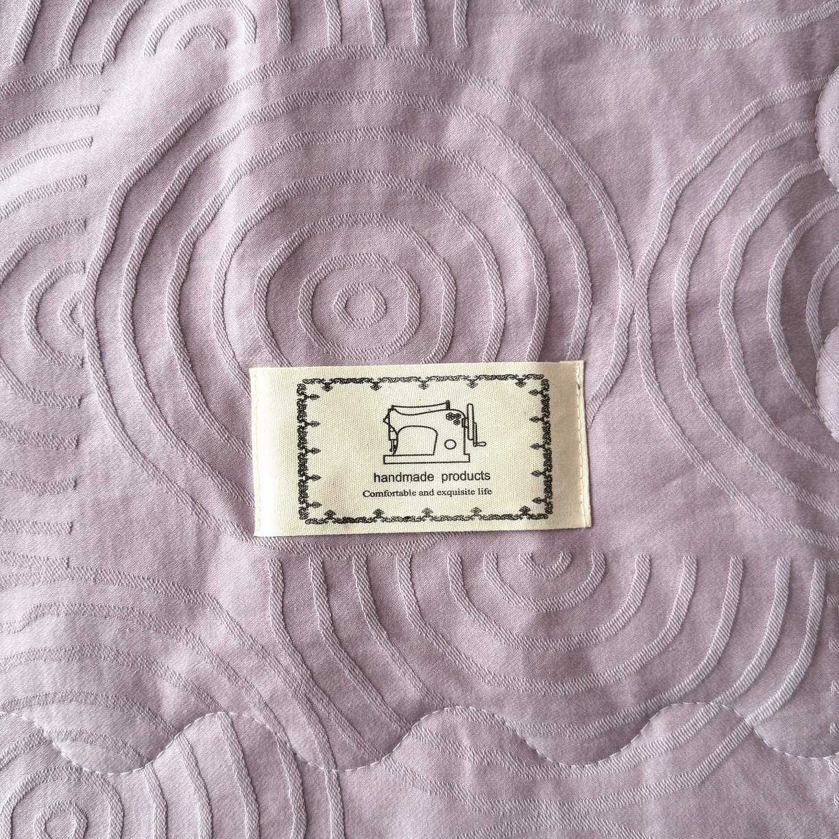 91家纺网 家纺一手货源 找家纺 乐家毛巾被（工厂自产自销） 2026春夏新款全棉60S长绒棉立体厚织提花整张棉花夏被四件套单夏被枕套夏凉被空 眠琴