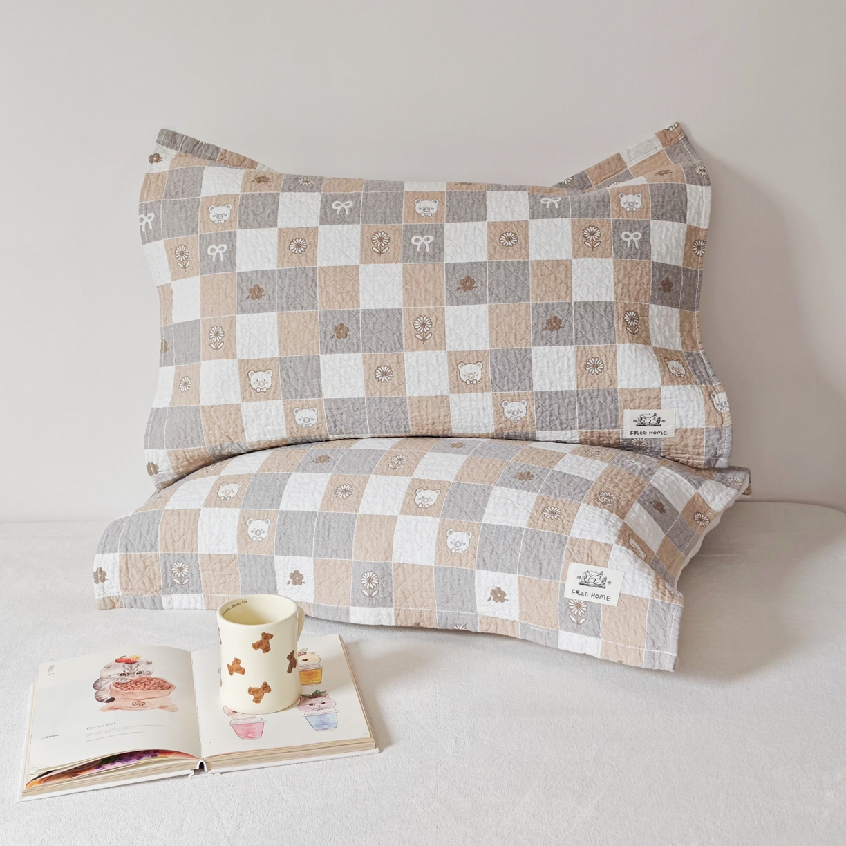 91家纺网 家纺一手货源 找家纺 沐瑟家纺  2026新款安心棉纯棉纱布枕巾 格子小熊