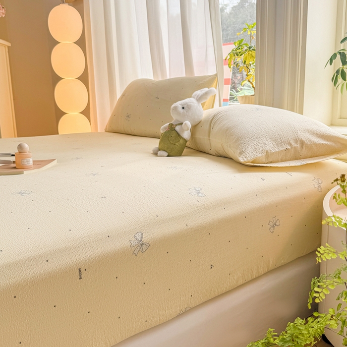 91家纺网 家纺一手货源 找家纺 丝芙妮家居 2026新款四季皱皱棉柔软透气不闷汗木棉床笠单件三件套-系列三 泡芙蝴蝶结