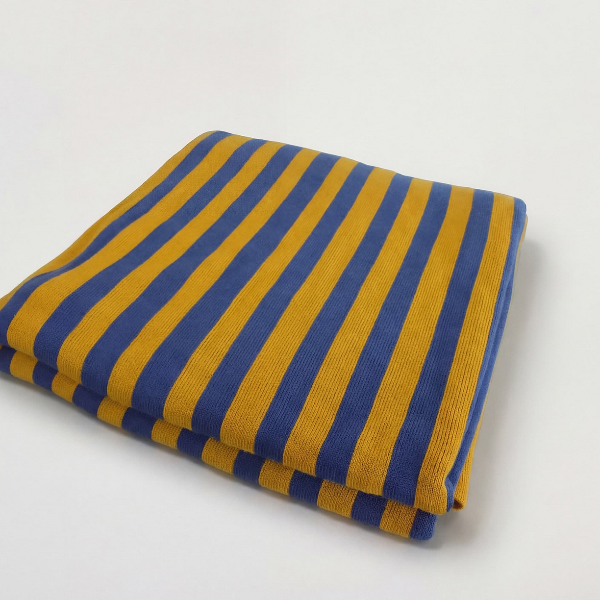 91家纺网 家纺一手货源 找家纺 暖绵绵家纺 2026新款丝光棉撞色条纹盖毯-海文（本款券后/折后零售价不得低于162元） 海文-蓝黄色