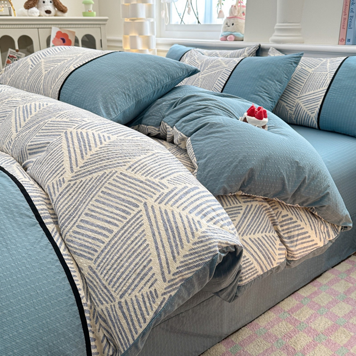 91家纺网 家纺一手货源 找家纺 诺梵家纺 2026春夏新品高克重拼接泡芙纱泡泡皱皱纱四件套 蓝纹序