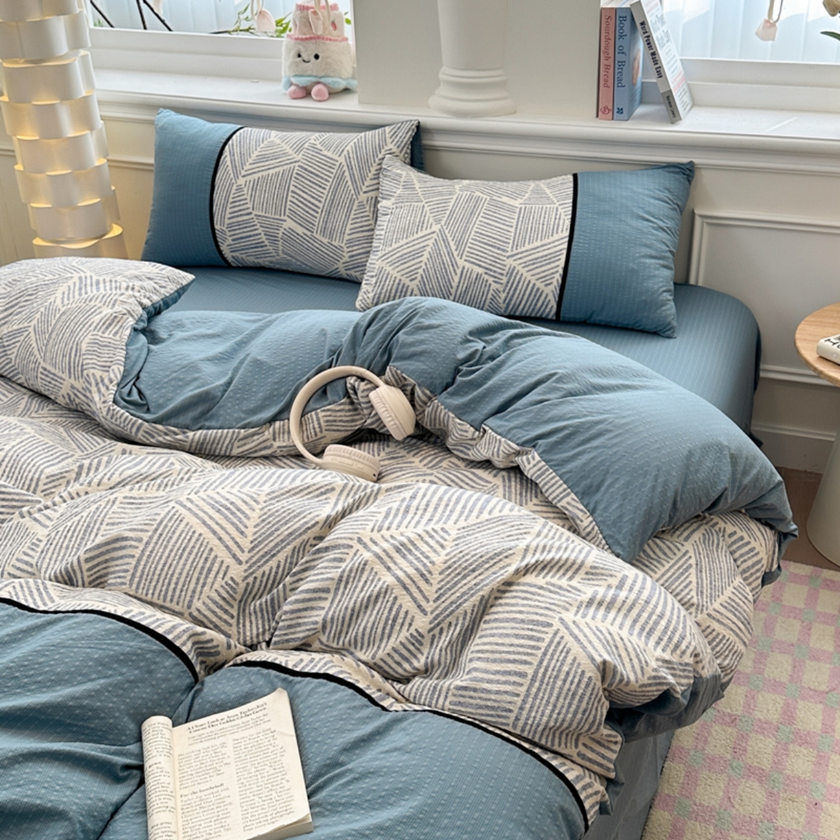 91家纺网 家纺一手货源 找家纺 诺梵家纺 2026春夏新品高克重拼接泡芙纱泡泡皱皱纱四件套 蓝纹序