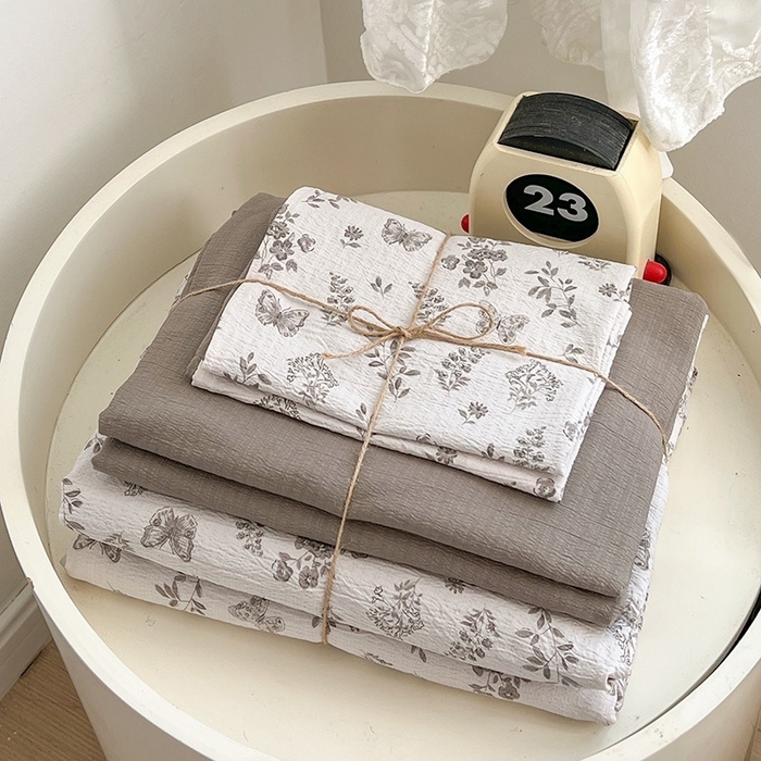 91家纺网 家纺一手货源 找家纺 朵朵家纺 2026新款高级感轻奢复古美拉德色系双层纱泡芙棉床品四件套加厚水洗双层纱软 素碟吟