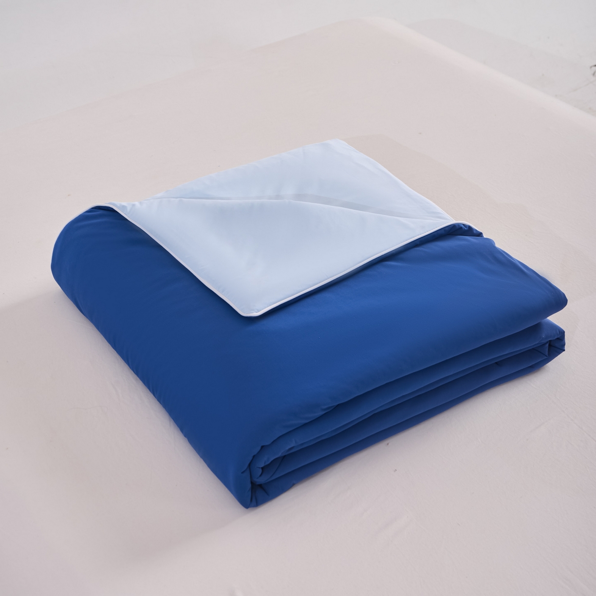 91家纺网 家纺一手货源 找家纺 漫仙阁家纺 2026年新款纯色凉感丝夏被空调被学生宿舍夏被夏凉被 浅蓝+深蓝