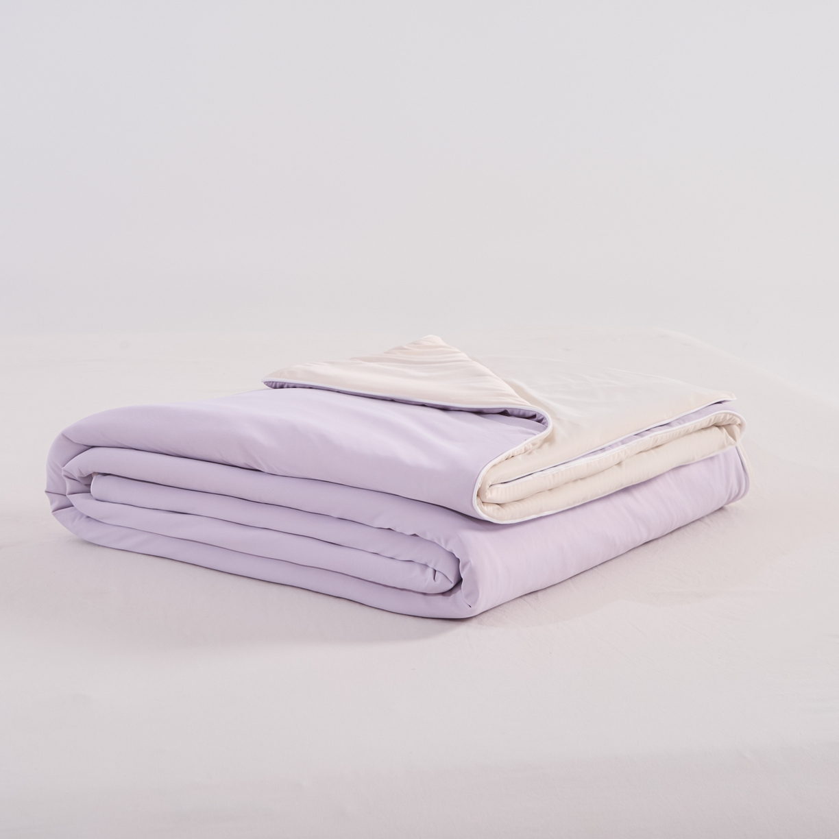 91家纺网 家纺一手货源 找家纺 漫仙阁家纺 2026年新款纯色凉感丝夏被空调被学生宿舍夏被夏凉被 奶油白+浅紫