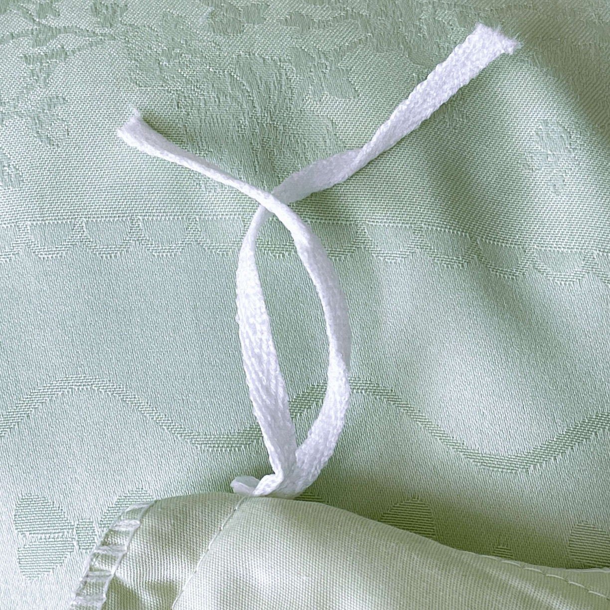 91家纺网 家纺一手货源 找家纺 大麦乐田 2026春夏新款贡缎提花花边双拼四件套 恬梦 奶油绿