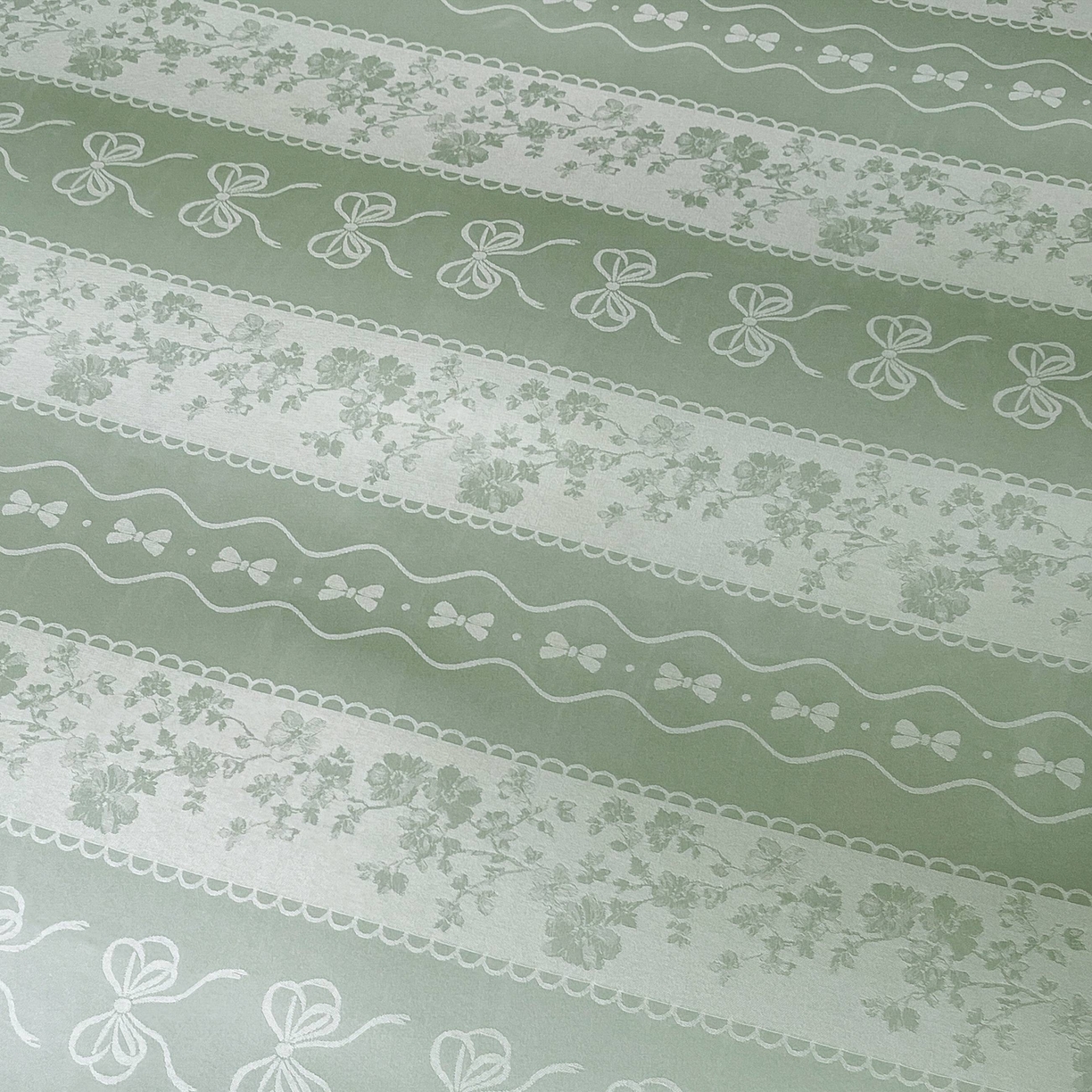 91家纺网 家纺一手货源 找家纺 大麦乐田 2026春夏新款贡缎提花花边双拼四件套 恬梦 奶油绿