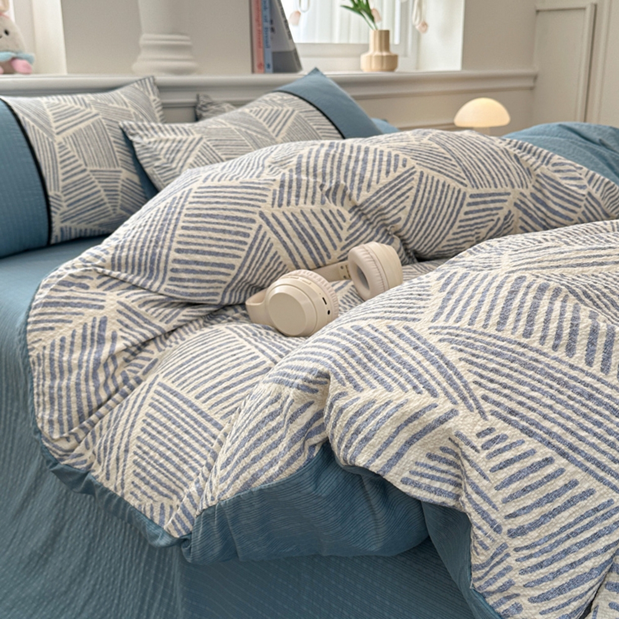 91家纺网 家纺一手货源 找家纺 铠畅家纺 2026春夏新品高克重拼接泡芙纱泡泡皱皱纱四件套 蓝纹序