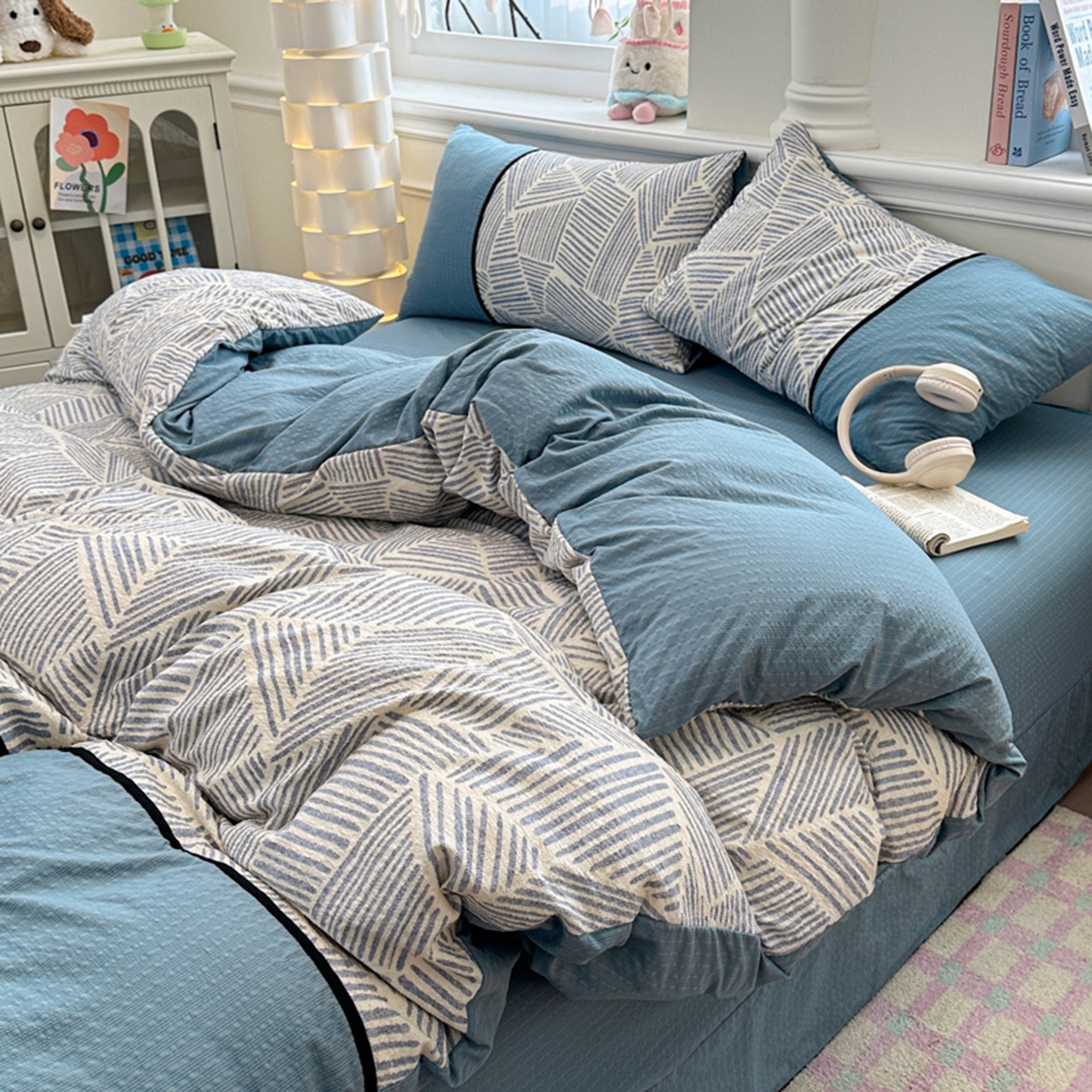 91家纺网 家纺一手货源 找家纺 铠畅家纺 2026春夏新品高克重拼接泡芙纱泡泡皱皱纱四件套 蓝纹序