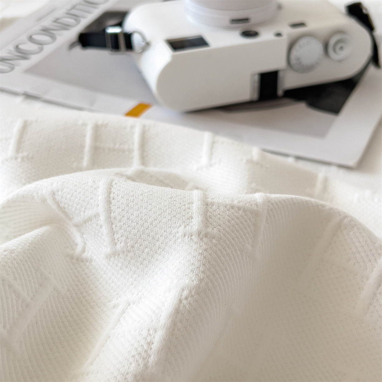 91家纺网 家纺一手货源 找家纺 云恋家纺 2026新款空气提花全棉盖毯夏被毯子 格调-雅白