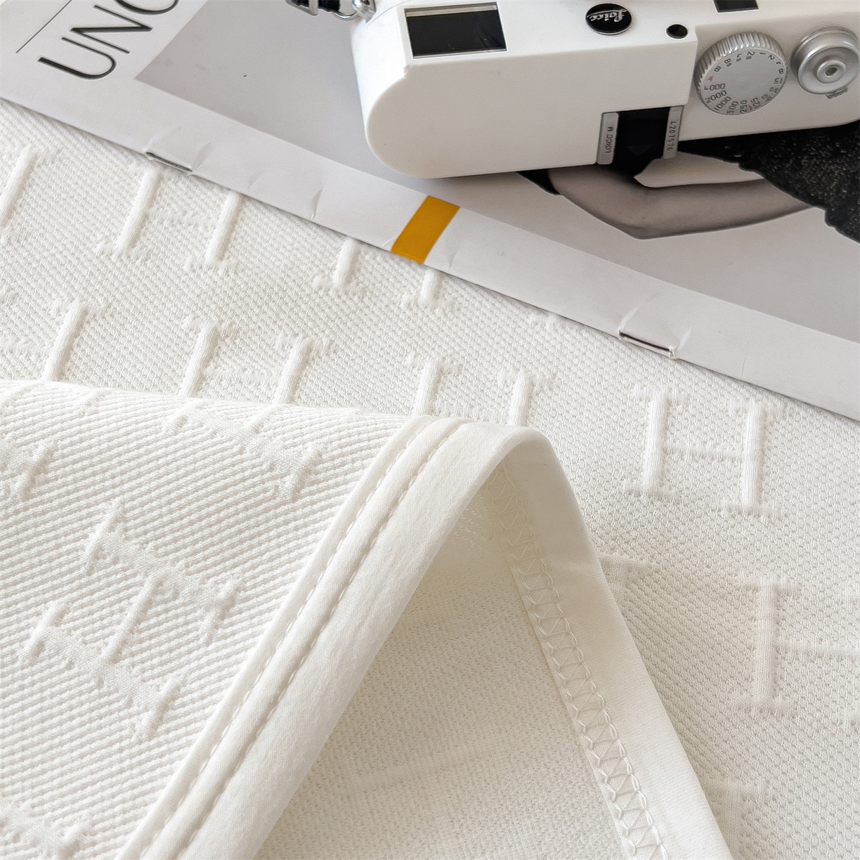 91家纺网 家纺一手货源 找家纺 云恋家纺 2026新款空气提花全棉盖毯夏被毯子 格调-雅白