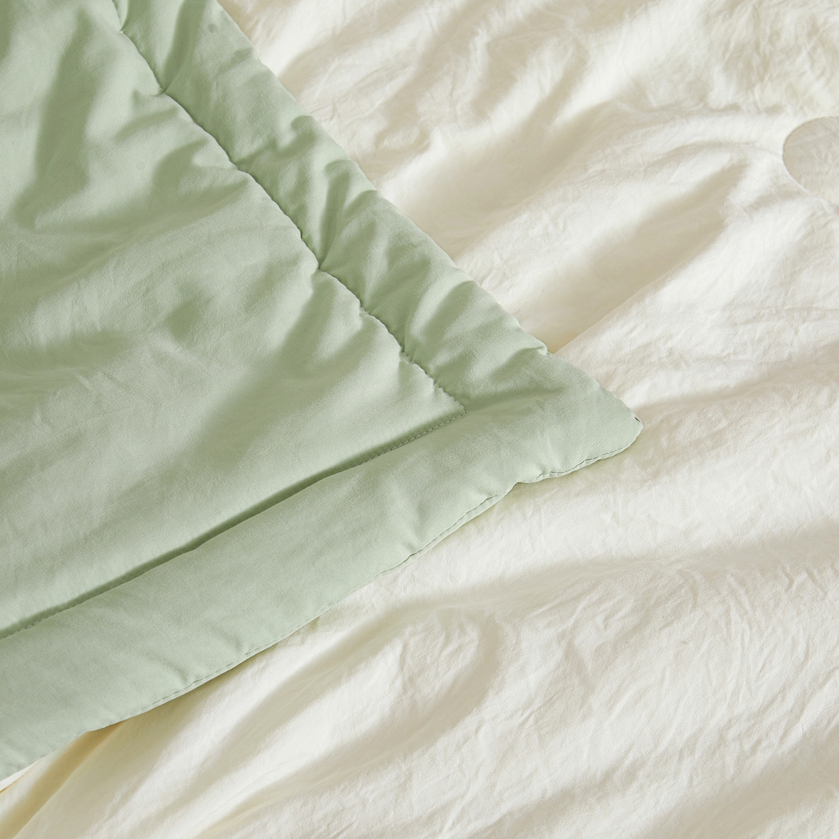 91家纺网 家纺一手货源 找家纺 样样红被业 2026新款水洗棉100%纯棉花夏被 云朵棉-白拼绿